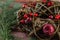 Gift boxes with a large red bow against a background bokeh of twinkling party lights. Luxury New Year gift. Christmas gift.