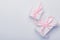 Gift boxes with pink ribbon on white-blue background. Concept holiday gift, congratulations. Top view, copy space, flat