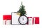 Gift boxes with red ribbon, wish list, christmas tree and clock