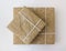 Gift boxes wrapped in beige craft paper and tied with white cotton thread. New Year\\\'s eco packaging