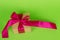 Gift in brown packaging with a ribbon. Women`s birthday present. Concept of giving a gift on holidays.