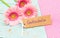 Gift card with german word, Gutschein, means voucher or coupon and beutiful pink flowers
