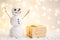 Gift card with a new year and christmas with a picture of a snowman with a sleigh against a backdrop of glowing garlands