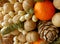 Gift Christmas bouquet. Pine cones, oranges, peanuts, walnuts, spruce branch in a beautiful package. Electoral focus. Christmas