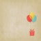 Gift on colored balloons retro striped background