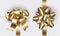 Gift holiday New Year bows and ribbons set for design. Realistic golden bow mock up top and side view with shadows isolated vector