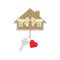 Gift key with heart on a chain and a house with a bow