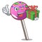 With gift lollipop with sprinkles mascot cartoon
