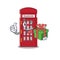 With gift miniature telephone booth above cartoon table
