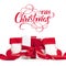 Gift red ribbons and boots of Santa Claus with text Merry Christmas. Lettering calligraphy