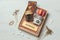 A gift set in the style of Hygge. Tea, handmade chocolate, knitted macaroons, a board game in a wooden box. The layout of the