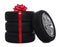 Gift set of wheels with winter tires on white background