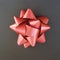 Gift wrapping idea! Black paper and red bow.