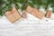 Gifts boxes with fir branches on wooden background top view