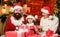 Gifts from Santa. Lovely daughter with parents. Christmas traditions concept. Father Santa claus costume with family