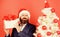 Gifts shop. Christmas gifts. Winter holidays. Boxing day. Christmas party. Man bearded hipster formal suit christmas