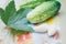 Gifts of a warm summer. Green crispy cucumbers close-up on the table