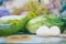 Gifts of a warm summer. Green crispy cucumbers close-up on the table