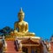 Gigant golden Buddha at Wat Hua Lang in Lotus posture