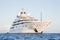 Gigantic big and large luxury mega or super motor yacht on the o