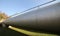 Gigantic steel pipe for the transport of gases or petroleum unde