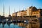 Gijon, Asturias, Spain; 09/26/2018: View of the dock of Gijon, Asturias, Spain, with reflections in the water, in Cimadevilla, the