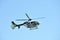 Gijon, Spain - July 24, 2022. Policia Nacional Spanish Police Eurocopter EC135 in full flight during Gijon International Air