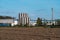 Gijzegem, East Flemish Region - Industrial site and brown soil of an agriculture field