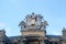 GIJÃ“N, SPAIN â€“ DECEMBER 14, 2019: La Laboral, Shield of Spain on the facade of the theater at Labor University, public City of