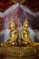 Gild Buddha Sculpture at Ancient Veranda of Wat Suthat, Bangkok of Thailand.