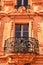 Gilded building windowed porch and iron ralings in France