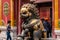 A gilded Chinese lion sculpture outside the Gate of Heavenly Purity, Forbidden City, Beijing