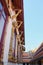 Gilded decorative elements adorn the wall of a Buddhist temple