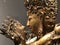 The gilded four-armed form of Avalokiteshvara Buddha statue