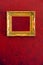 Gilded Gold Frame on Red Wall Background