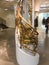 Gilded railing detail in Galeries Lafayette, Paris, France