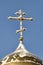 Gilded Russian Orthodox Cross on the Church Cupola in the Snow