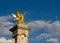 Gilded sculpture on Pont Alexandre III in Paris of