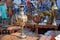 Gilded vase with Indian ornaments on a table made of mahogany