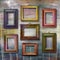 Gilded wooden frames for pictures on jeans background