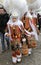 \'Gille\' with heavy ostrich feathers hat and oranges, Binche Carnival,Belgium