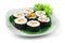 Gimbap also spelled Kimbap ingredients such as vegetables, Spam Ham that are rolled in gim dried sheets of seaweed