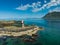 Gimsoy lighthouse on sea rocks, Lofoten Norway