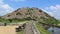 Gingee Fort hill and visitors vehicles