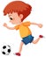 Ginger child kicking a soccer ball