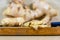 Ginger root Zingiber officinale on light and woody background