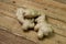 Ginger on a wooden background. Ginger root.