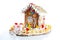 Gingerbread candy sugar house. Fairy tail candyhouse covered with snow and colorful candies Homemade gingerbread house