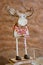 Gingerbread Christmas deer beautiful bright and tasty standing on a stand