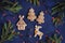 Gingerbread cookies on blue background - house, trees, deer